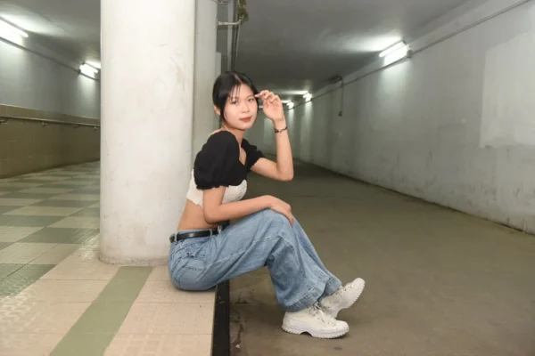 Outfits That Look Better with High-Top Sneakers Woman in High Top Sneakers